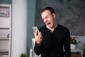 Angry annoyed man talking by phone, shouting guy Royalty Free Stock Photo