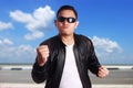 Angry Asian Man in Black Leather Jacket Ready to Fight Royalty Free Stock Photo