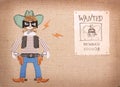 Bandit in cowboy clothes and black mask with guns.Paper wanted c