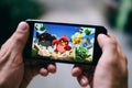 COLOGNE, GERMANY - FEBRUARY 27, 2018: Angry Birds App Game played on Apple iPhone