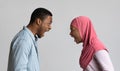 Angry black muslim couple yelling at each other Royalty Free Stock Photo