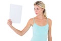 Angry blonde holding a sheet of paper Royalty Free Stock Photo