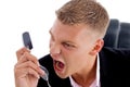 Angry boss shouting on phone