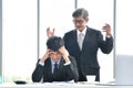 Angry boss yelling at employee, business concept, Asian businessman Royalty Free Stock Photo