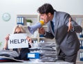 Angry boss yelling at his assistant secretary Royalty Free Stock Photo