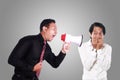 Angry Boss Yelling to His Worker With Megaphone Royalty Free Stock Photo