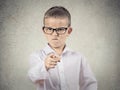 Angry bossy boy pointing finger at someone Royalty Free Stock Photo