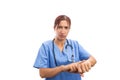 Angry bossy woman nurse or doctor making late time gesture Royalty Free Stock Photo