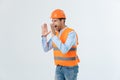 Angry builder or constructor yelling at somebody as fury concept isolated on white background with copyspace. Royalty Free Stock Photo