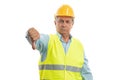 Angry builder showing thumb down