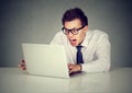 Angry business man screaming at computer Royalty Free Stock Photo