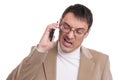 Angry business man screaming on mobile phone Royalty Free Stock Photo