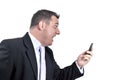 Angry business man shouting to a mobile phone Royalty Free Stock Photo