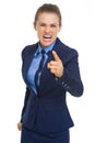 Angry business woman threatening with finger