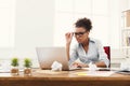 Angry business woman working on laptop at office Royalty Free Stock Photo