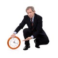Angry businessman and clock