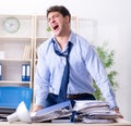 Angry businessman frustrated with too much work Royalty Free Stock Photo