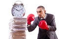 Angry businessman hitting clock isolated Royalty Free Stock Photo