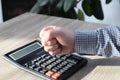 Businessman pounding fist on table, cropped image. Angry businessman showing his fists. Frustrated businessman hand clenched fists