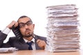 Angry businessman with stack Royalty Free Stock Photo