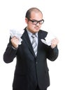 Angry businessman tear off paper
