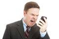 Angry Businessman Yelling into Phone