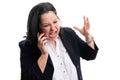 Angry businesswoman in formalwear yelling while making phonecall Royalty Free Stock Photo