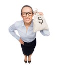 Angry businesswoman holding money bag with dollar Royalty Free Stock Photo