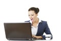 Angry businesswoman shouting on her laptop