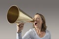 Angry Businesswoman Shouting Through Megaphone Royalty Free Stock Photo