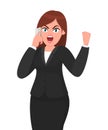 Angry businesswoman speaking on smartphone and shouting or screaming and raising fist gesture. Technology, phone and human emotion