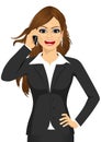 Angry businesswoman talking on mobile phone