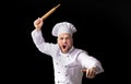 Angry Chef Bakerman Raising Rolling Pin Threateningly, Studio Shot Royalty Free Stock Photo