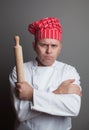 Angry chef with rolling pin Royalty Free Stock Photo
