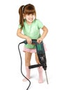 Angry child girl with electric drill Royalty Free Stock Photo