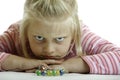 Angry child is lying on the floor Royalty Free Stock Photo