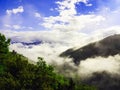 Angry clouds over range of mountains