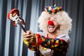 Angry clown with guitar