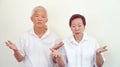 Angry complain Asian elderly couple with upset expression and ge Royalty Free Stock Photo