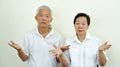 Angry complain Asian elderly couple with upset expression and ge Royalty Free Stock Photo