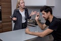 Angry Couple Have Disagreement in Kitchen at Home. Quarrel in Young Family.