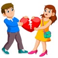 Angry couple holding broken heart