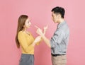 Angry couple pointing at each other while arguing Royalty Free Stock Photo