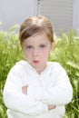 Angry disappointed gesture little girl meadow Royalty Free Stock Photo
