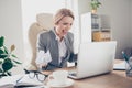 Angry, disappointed, surprised woman in jacket holding crumpled Royalty Free Stock Photo