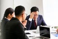 Angry dissatisfied Senior business man asia Meeting Communication Discussion Working Office serious,pointing at terms failed to p Royalty Free Stock Photo