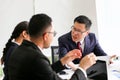 Angry dissatisfied Senior business man asia Meeting Communication Discussion Working Office serious,pointing at terms failed to p Royalty Free Stock Photo