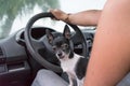 Angry dog sitting on the legs of the owner. Royalty Free Stock Photo