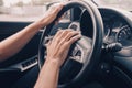 Driver presses the horn of the car to attract the attention of the car bully and avoid road accident. Stress and aggressive