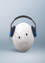 Angry egg with headphones, unbearable, annoying music concept